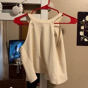 cream colored crop top with rose gold back zipper